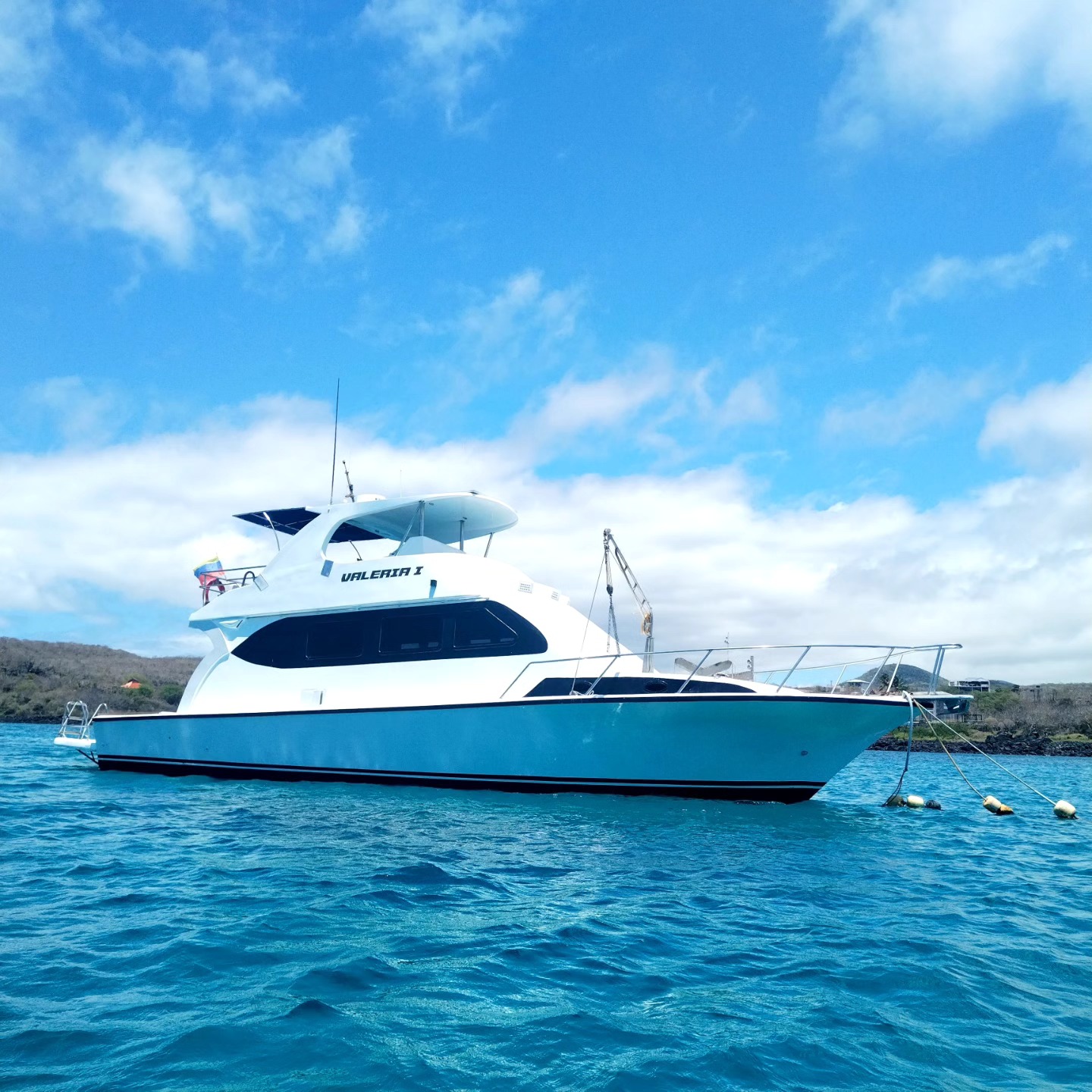 Yacht Valeria I tethered to buoys in Galapagos waters | Ile Tours