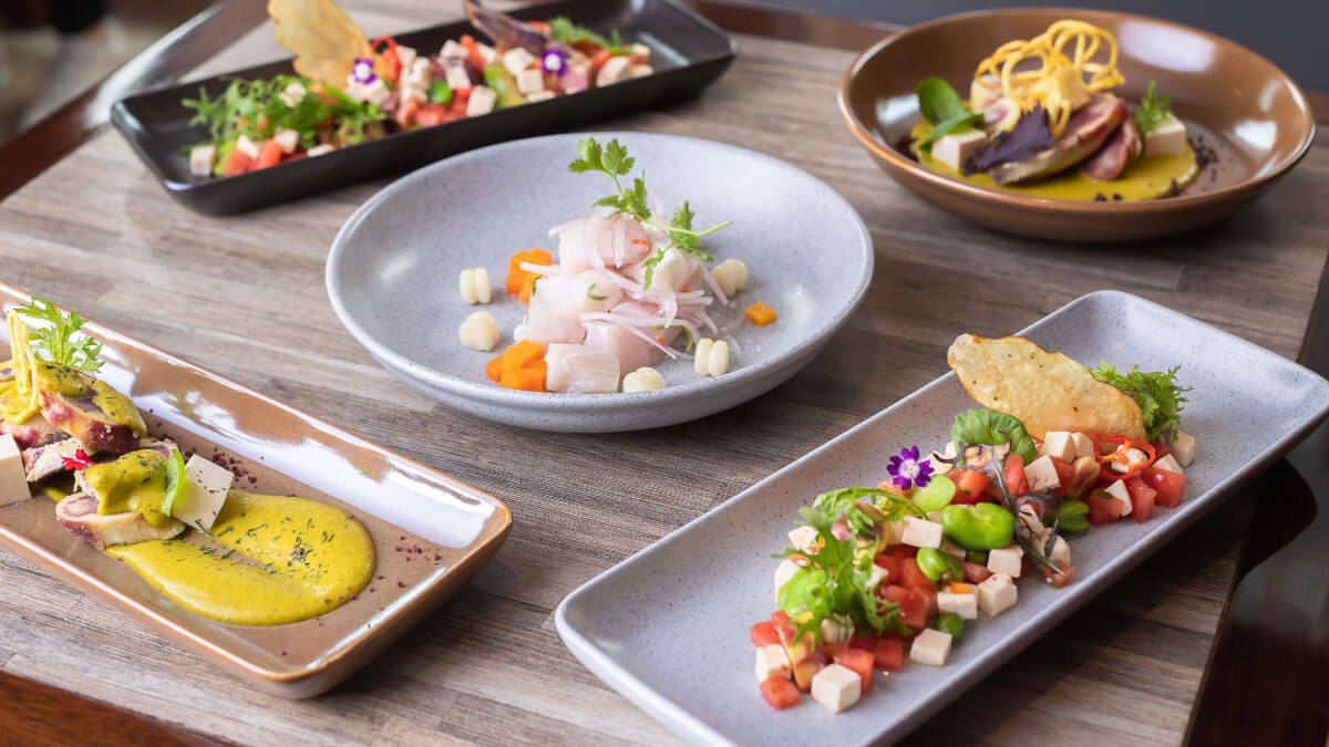 Traditional Peruvian ceviche dishes served with lime, onion, and chili | Ile Tours