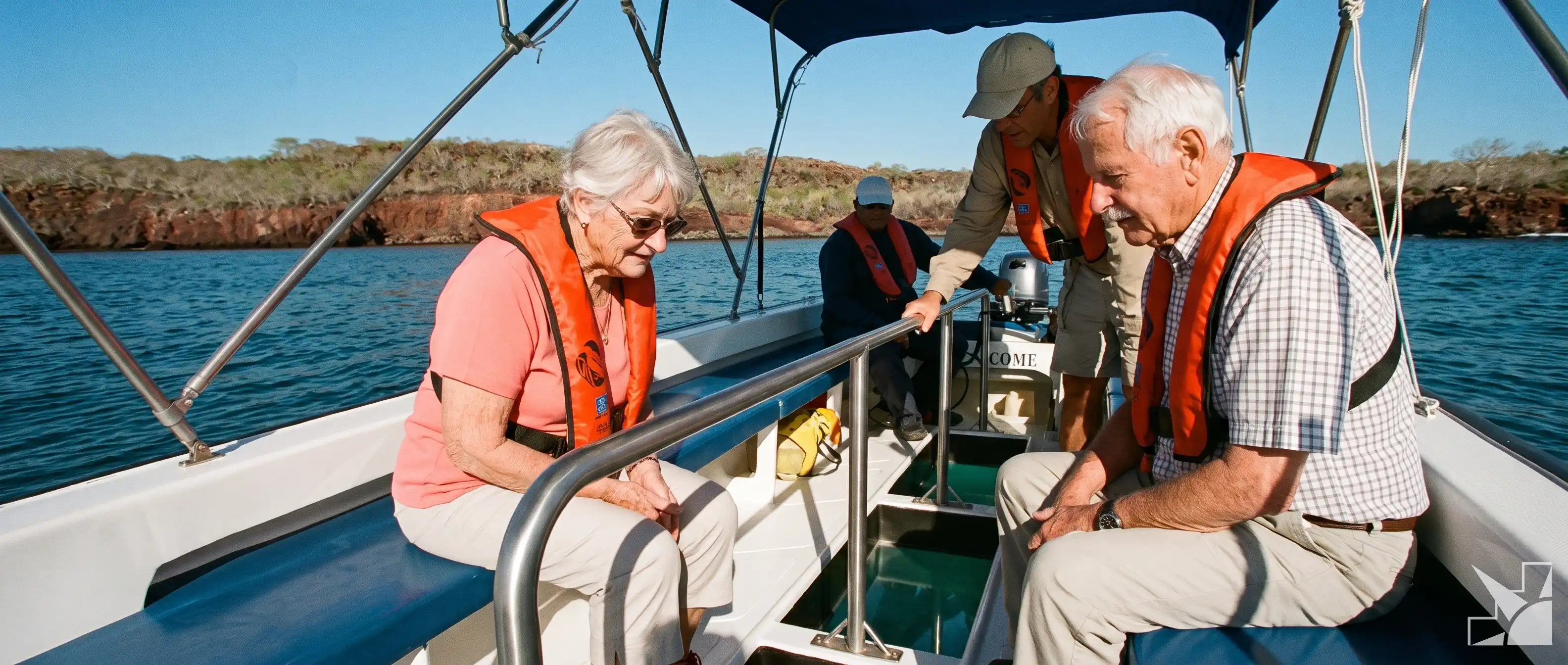 Senior travelers boarding a Galápagos zodiac boat with crew assistance and safety equipment during island excursion