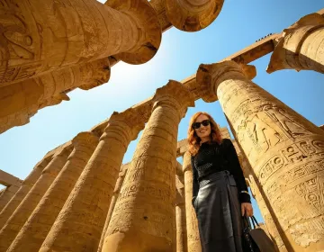 Mature couple enjoying a private, uncrowded tour of Karnak Temple in perfect winter weather | Ile Tours