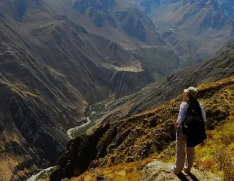 Panoramic view of the Colca Canyon terraces and river | Ile Tours